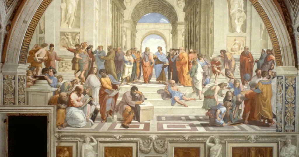 Pintura renascentista com filósofos gregos reunidos em um grande salão, com Platão e Aristóteles ao centro.